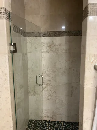 Glass shower with tile