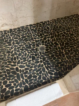 Pebble tile shower floor